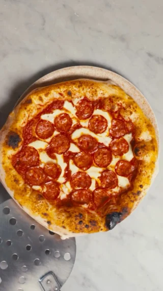 Instagram post from lovebirdspizza. This post is in position 1.