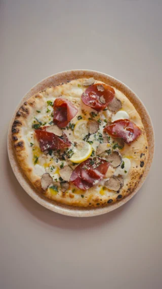 Instagram post from lovebirdspizza. This post is in position 1.