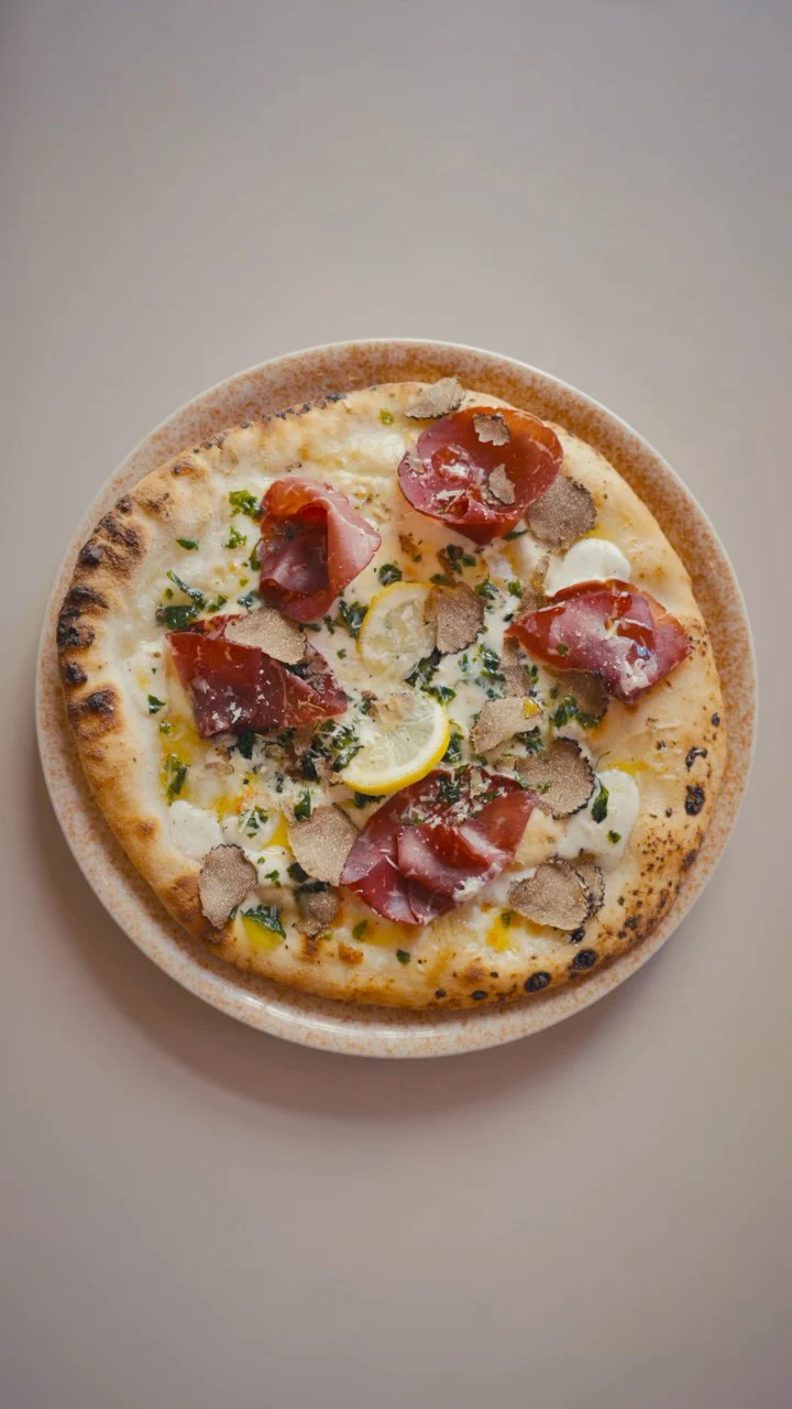 Instagram post from lovebirdspizza. This post is in position 0.