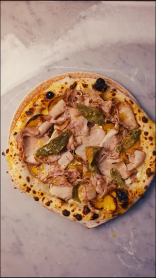 Instagram post from lovebirdspizza. This post is in position 1.