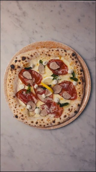 Instagram post from lovebirdspizza. This post is in position 1.