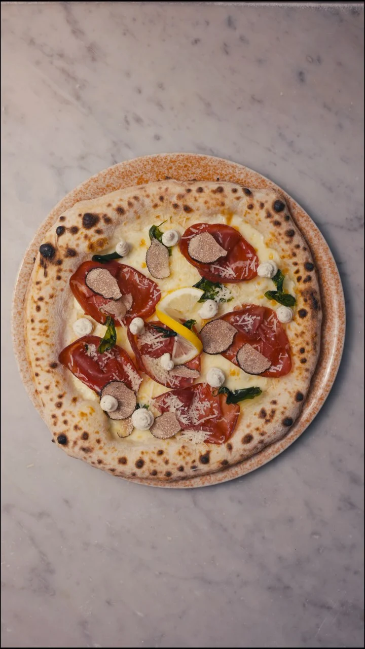 Instagram post from lovebirdspizza. This post is in position 0.