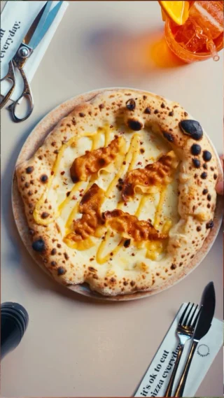 Instagram post from lovebirdspizza. This post is in position 1.