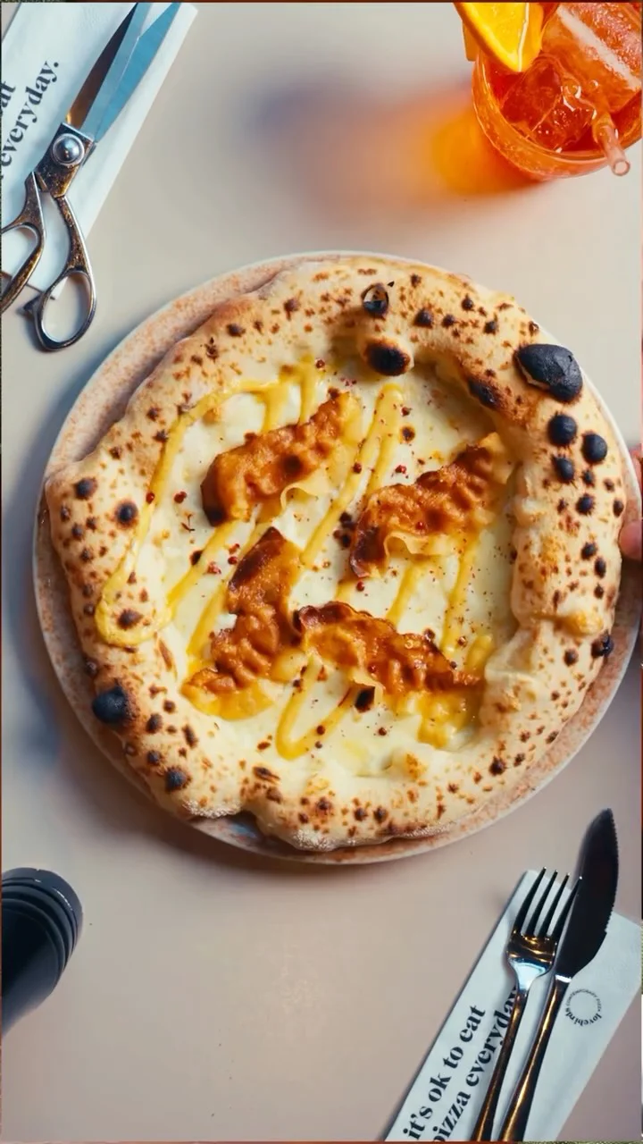Instagram post from lovebirdspizza. This post is in position 0.