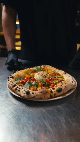 Instagram post from lovebirdspizza. This post is in position 1.