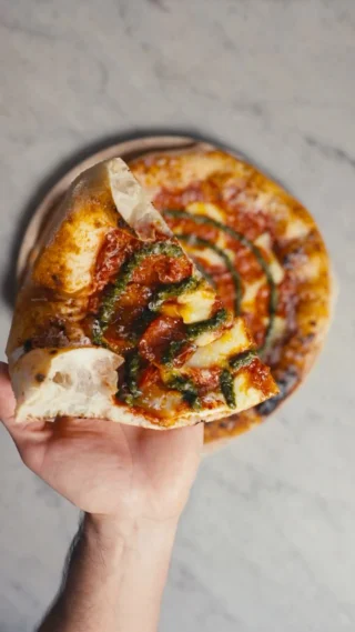 Instagram post from lovebirdspizza. This post is in position 16.
