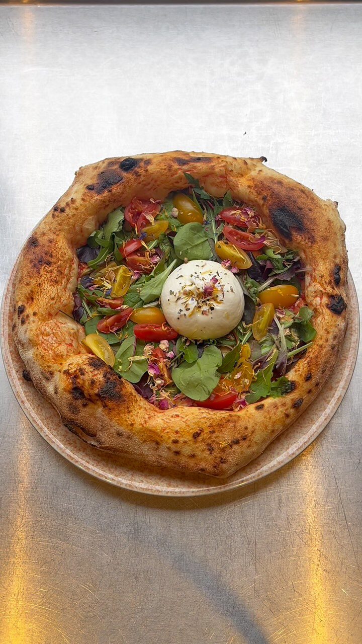 Instagram post from lovebirdspizza. This post is in position 9.