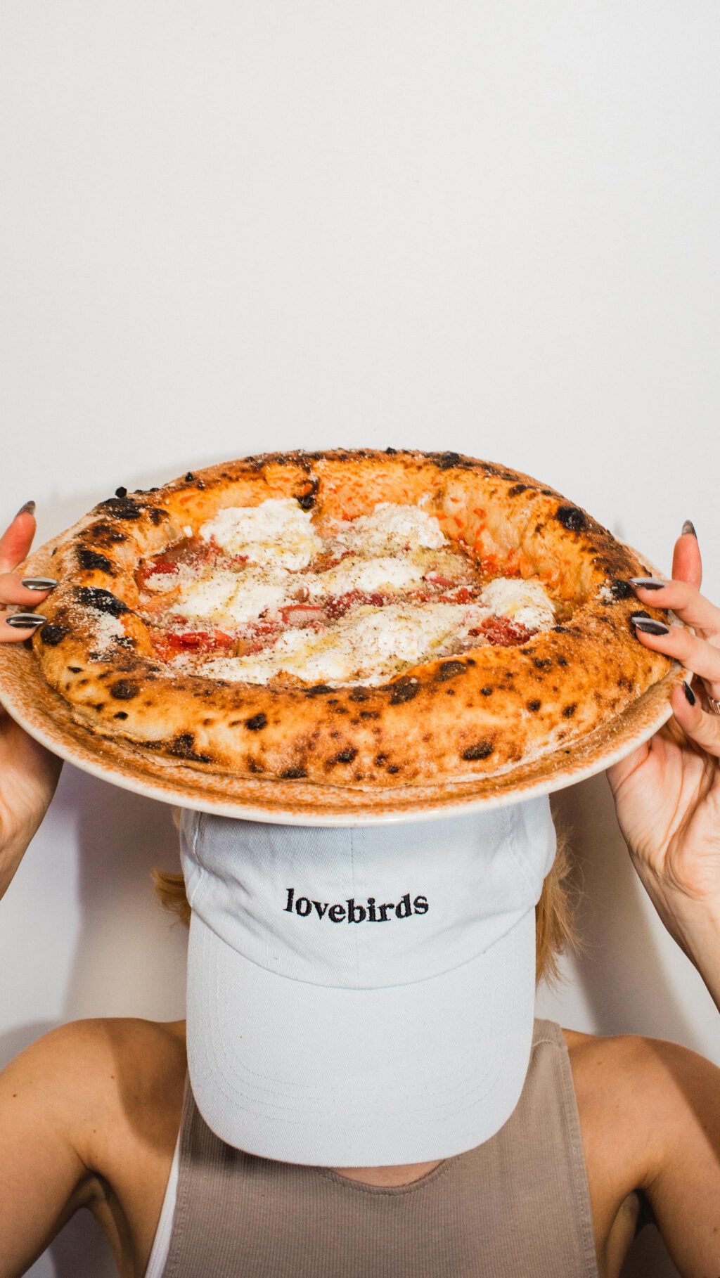 Instagram post from lovebirdspizza. This post is in position 8.